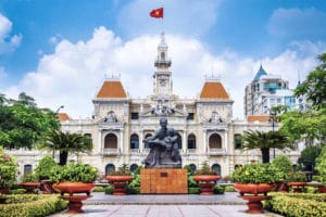 Square in Vietnam Asia with a historical statue of Ho Chi Minh