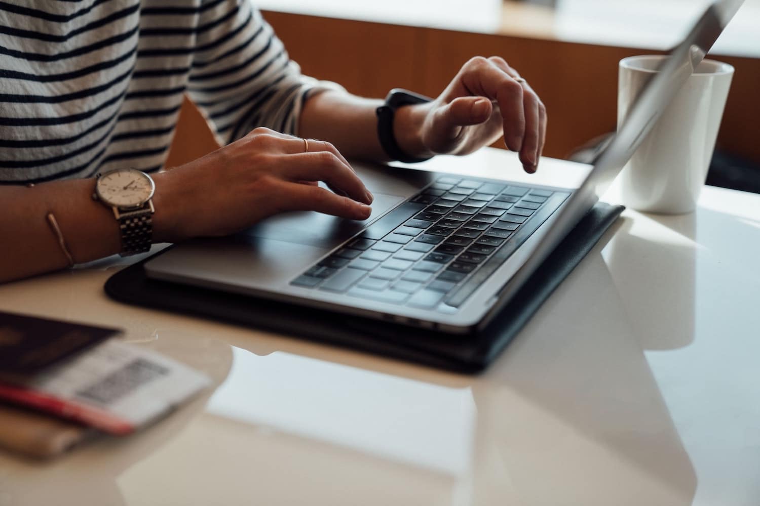 Digital nomad working on his laptop while traveling