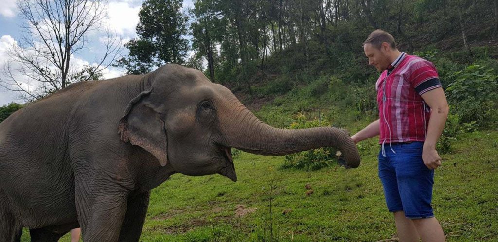 Playing at the Elephant Sanctuary in Thailand