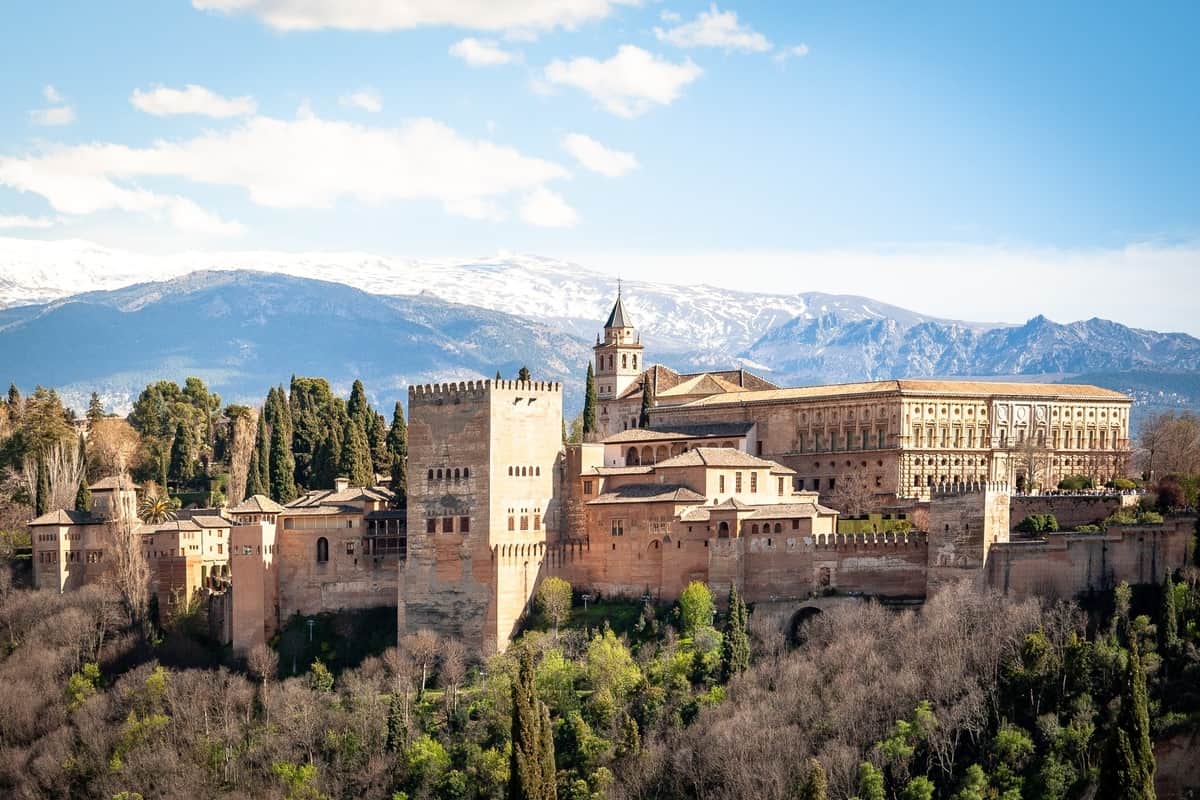 Historical complex on a hillside. Alhambra Unique Places To Visit In Spain