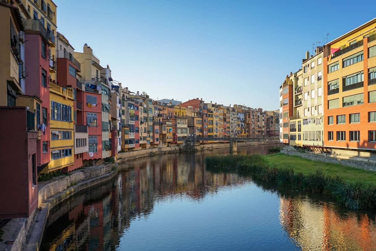 European city with colorful houses over a river. Girona Unique Places To Visit In Spain