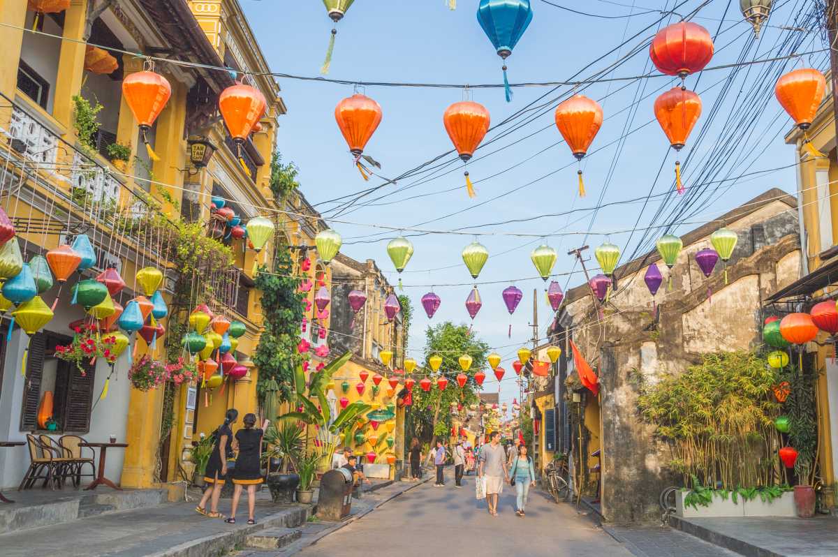 Colorful lanterns above an evening street in Hoi An Old Town