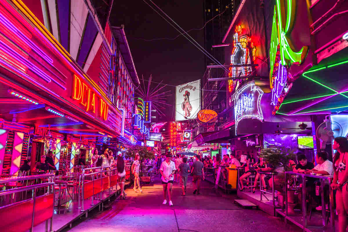 Pink adult-only alley in Bangkok with neons