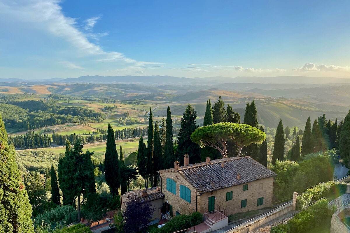 Rolling hills and villa in Tuscany.