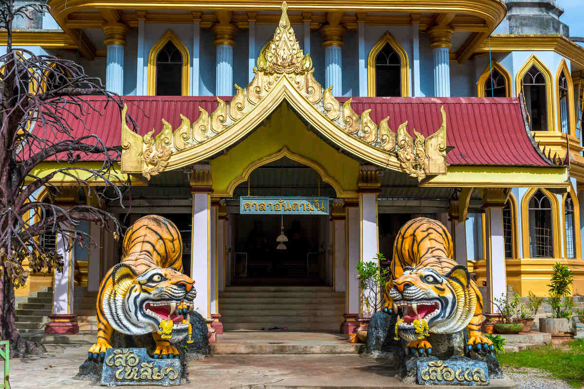 Statues of tiger at the Tiger Cave Temple in Krabi