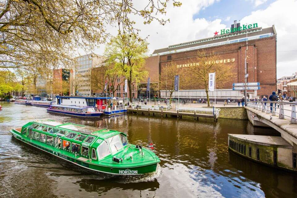 Boat on a canal near the Heineken experience in Amsterdam