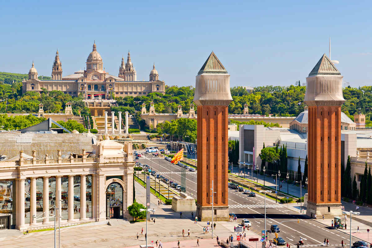 Plaza with distant architecture and lights. Is Barcelona safe? Safety tips for travelers