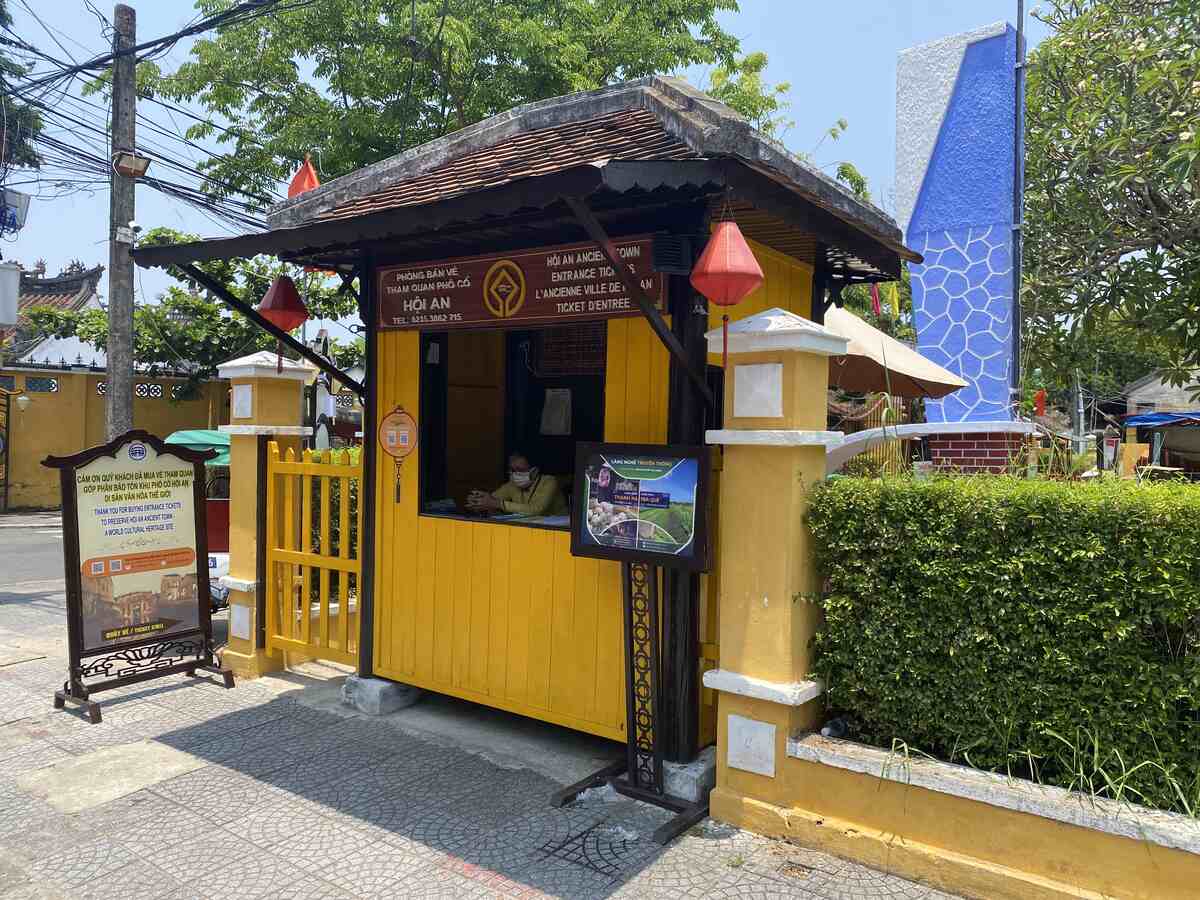 Traditional guardhouse with yellow walls.