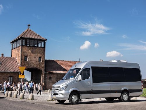 Van parked in front of the main entrance at Auschwitz camp