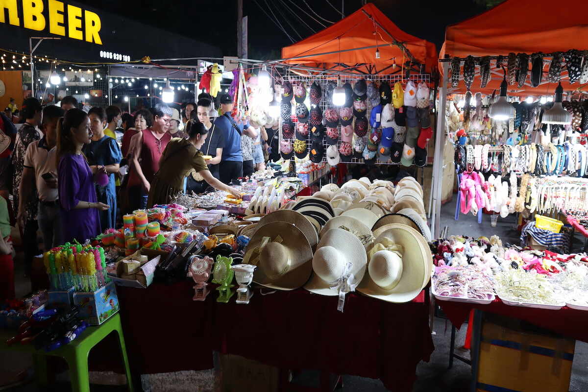Night market stalls with goods on display.