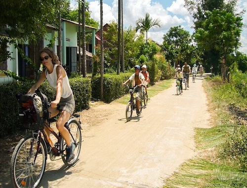 Tourists traveling around the Vietnamese countryside on a Hoi An cycling tour