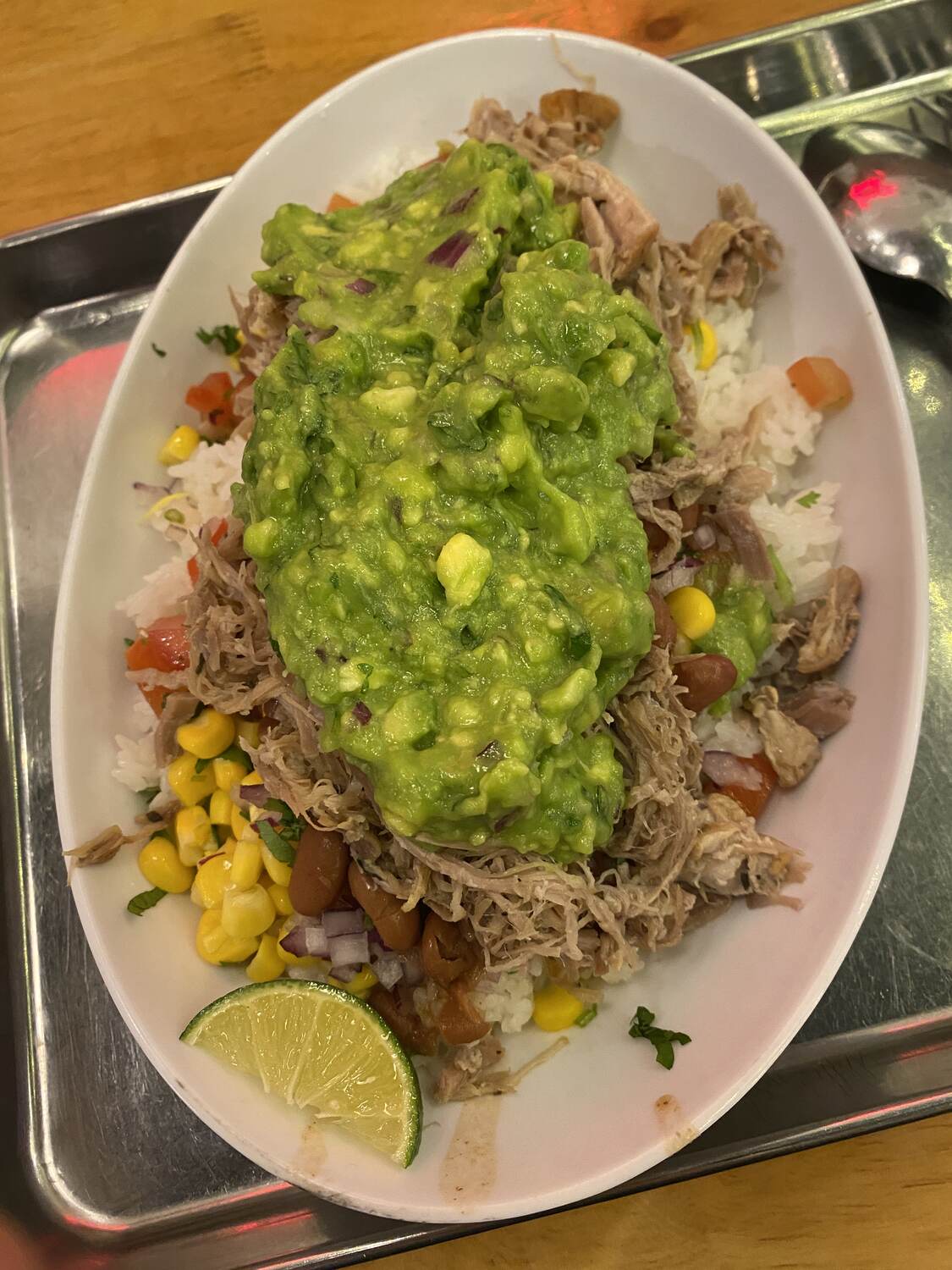 Guacamole over rice and beans