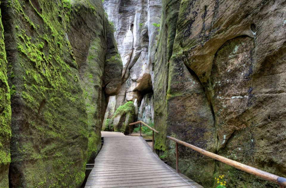Narrow gorge with a wooden walkway.