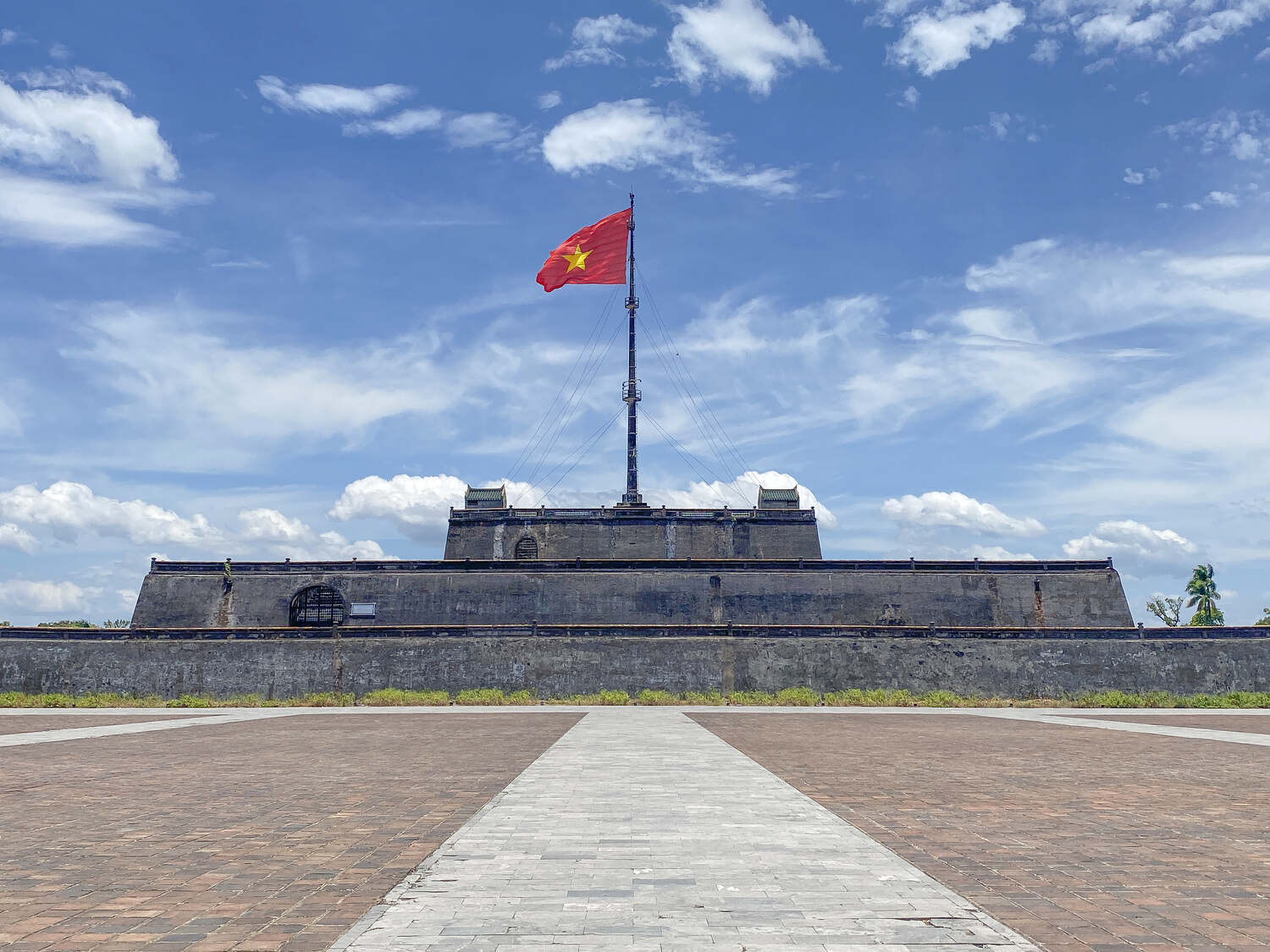 Hue Imperial City with Vietnamese flag