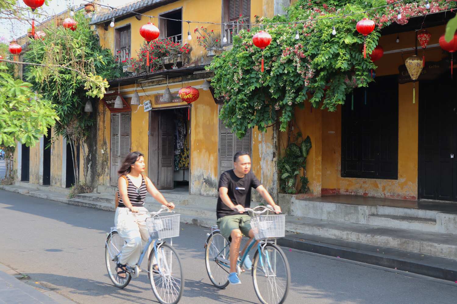 Tourist cycling in Hoi An
