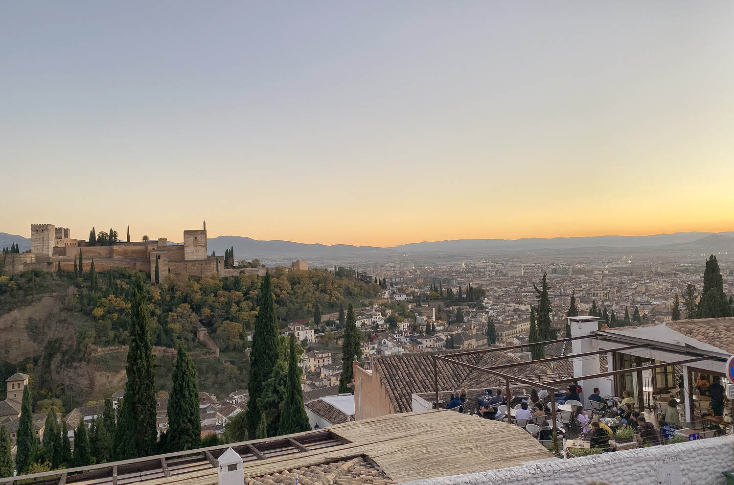 Views of the Alhambra from San Nicolas mirador right during sunset