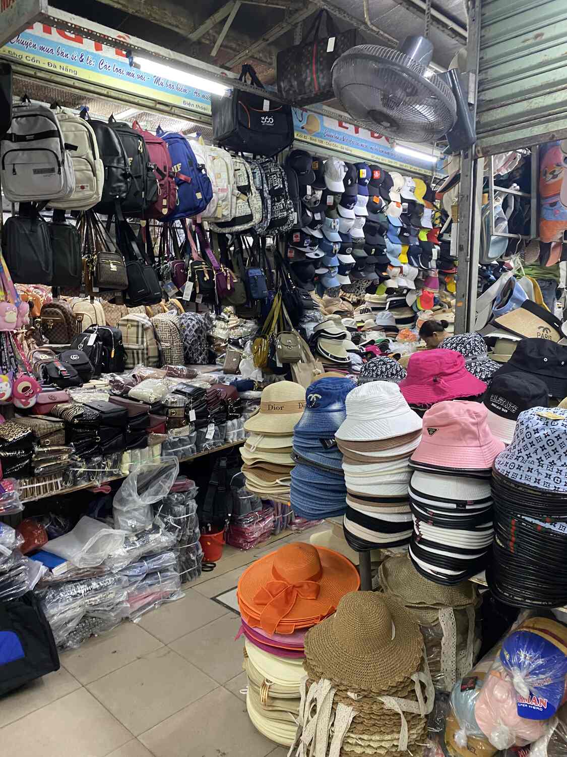 Hats and bags at the market in Da Nang