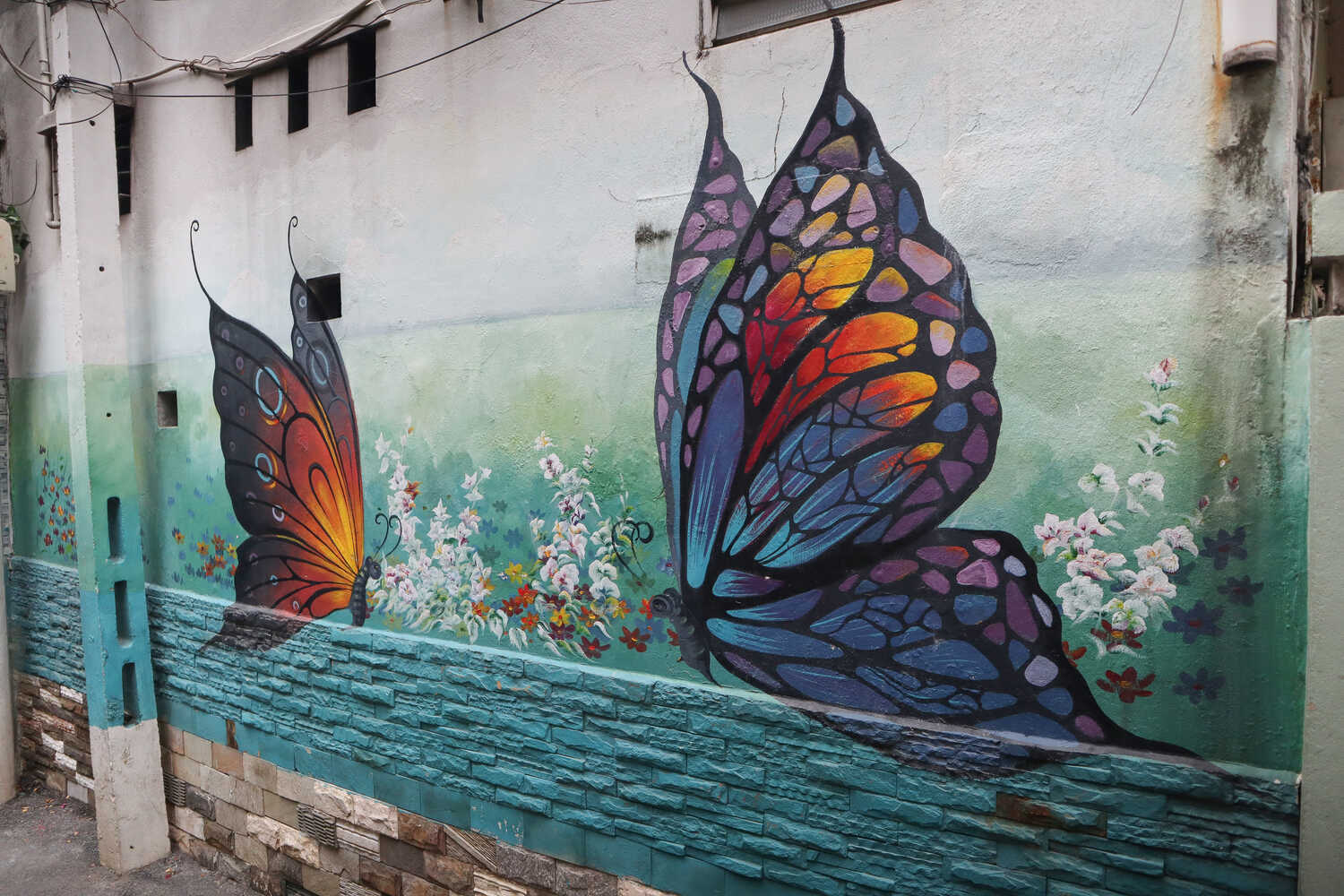 Butterfly graffiti at Da Nang Fresco Village