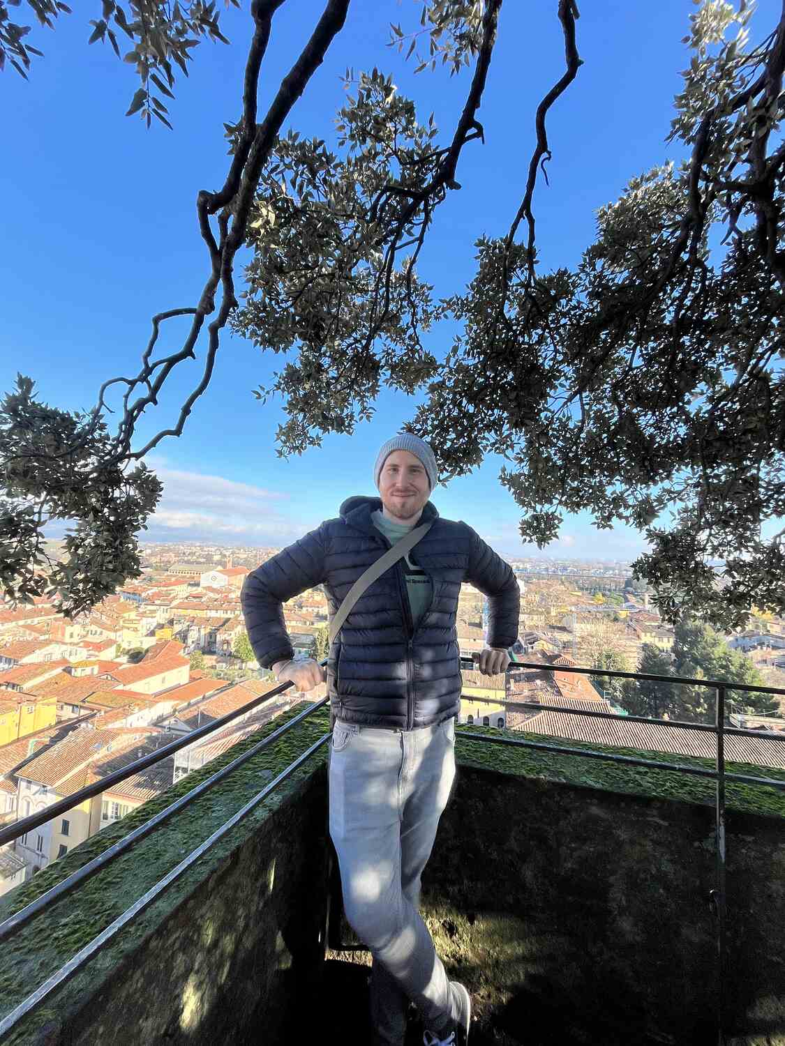 Man-taking-a-photo-at-a-viewpoint-in-Lucca