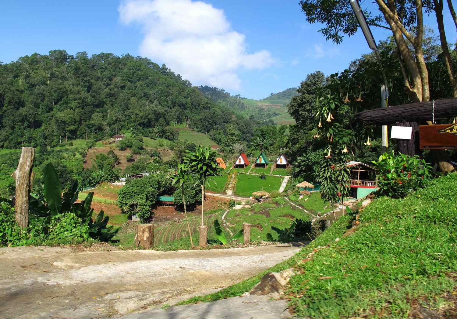 View-of-the-jungle-landscape-and-rural-rural-cityscape-at-Mon-Jam-hills-and-mountains-for-Thai-tourists-on-a-journey-of-discovery-and-tourism-in-Chiang-Mai-city-in-Chiang-Mai